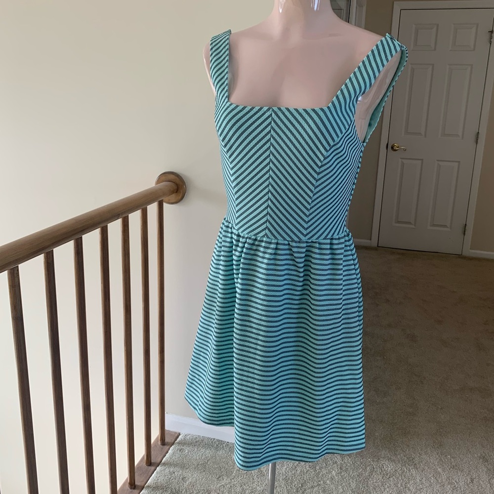 Mint green/ Tiffany blue dress.
